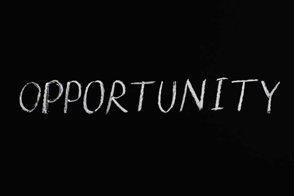 opportunity lettering text on black background