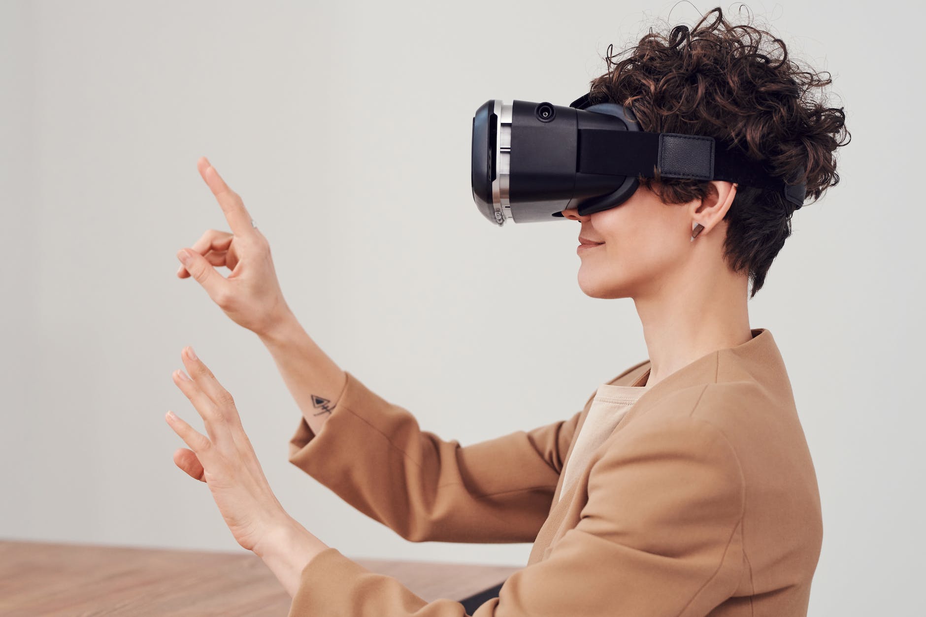 woman using virtual reality goggles