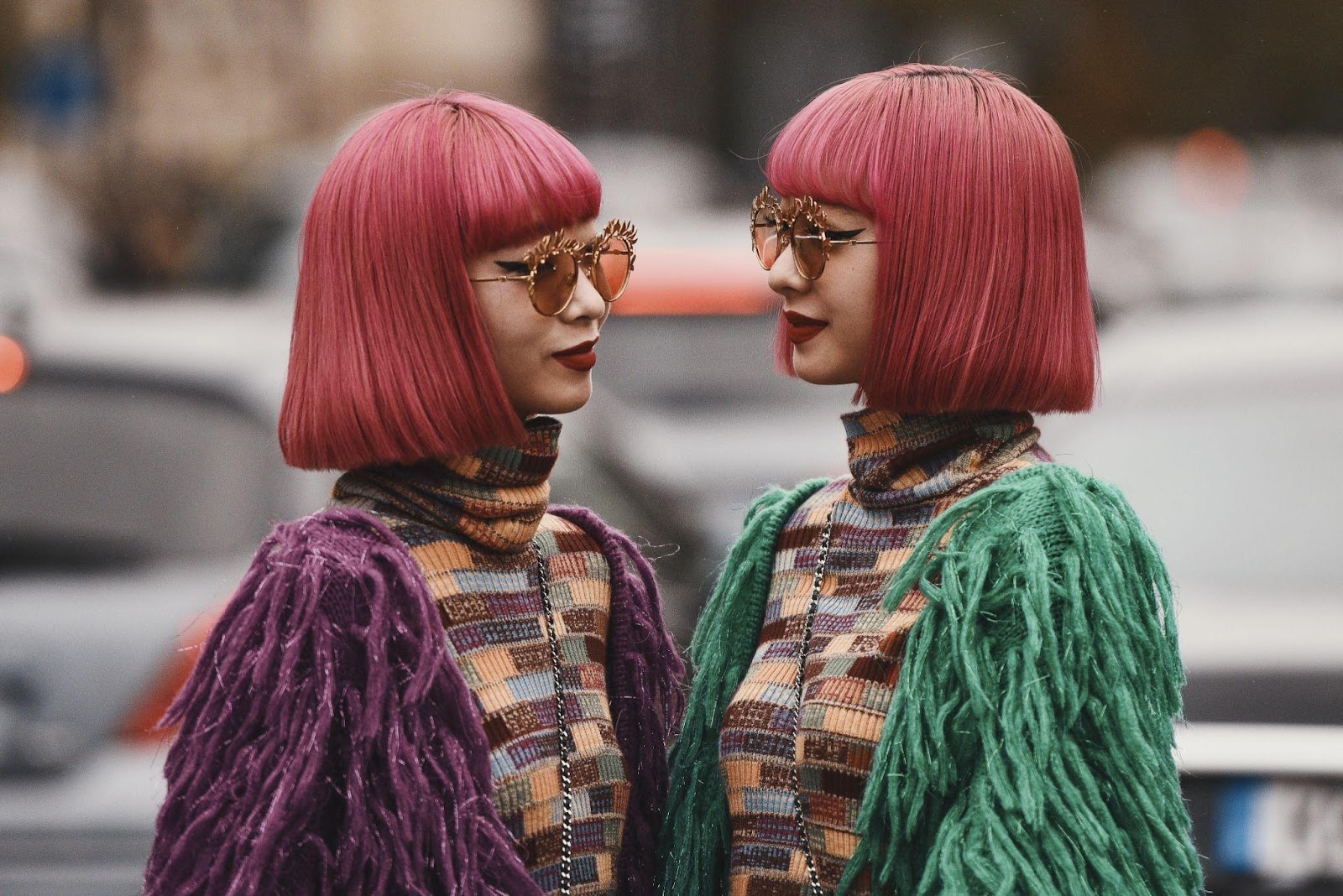 Twins Ayax Amiaya and Ami Amiaya outside a fashion show during Paris Fashion Week