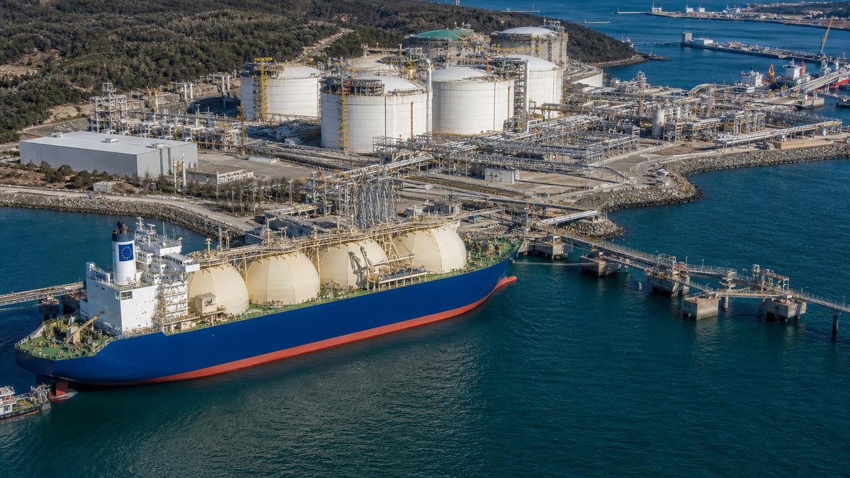 LNG export terminal with cargo vessel at coastal port for international trade